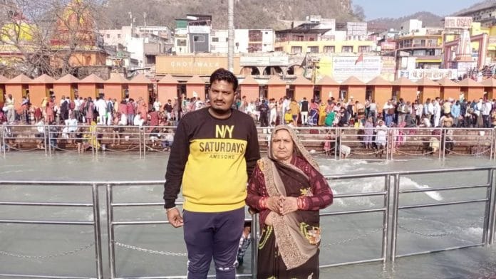Vikram Radhuvanshi, a resident of Kherua Haat village in MP's Vidisha district, and his aunt Maya Bai, at the Kumbh Mela | Photo by special arrangement