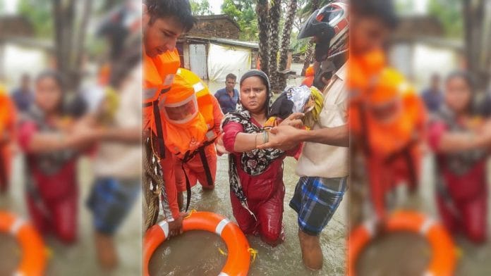 NDRF team carries out a rescue operation after lanfall of cyclone Yaas at South 24 parganas in West Bengal, on 26 May 2021 | PTI