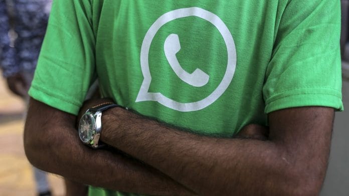 Facebook Inc. WhatsApp logo is displayed on a green t-shirt during a roadshow in Pune | Bloomberg