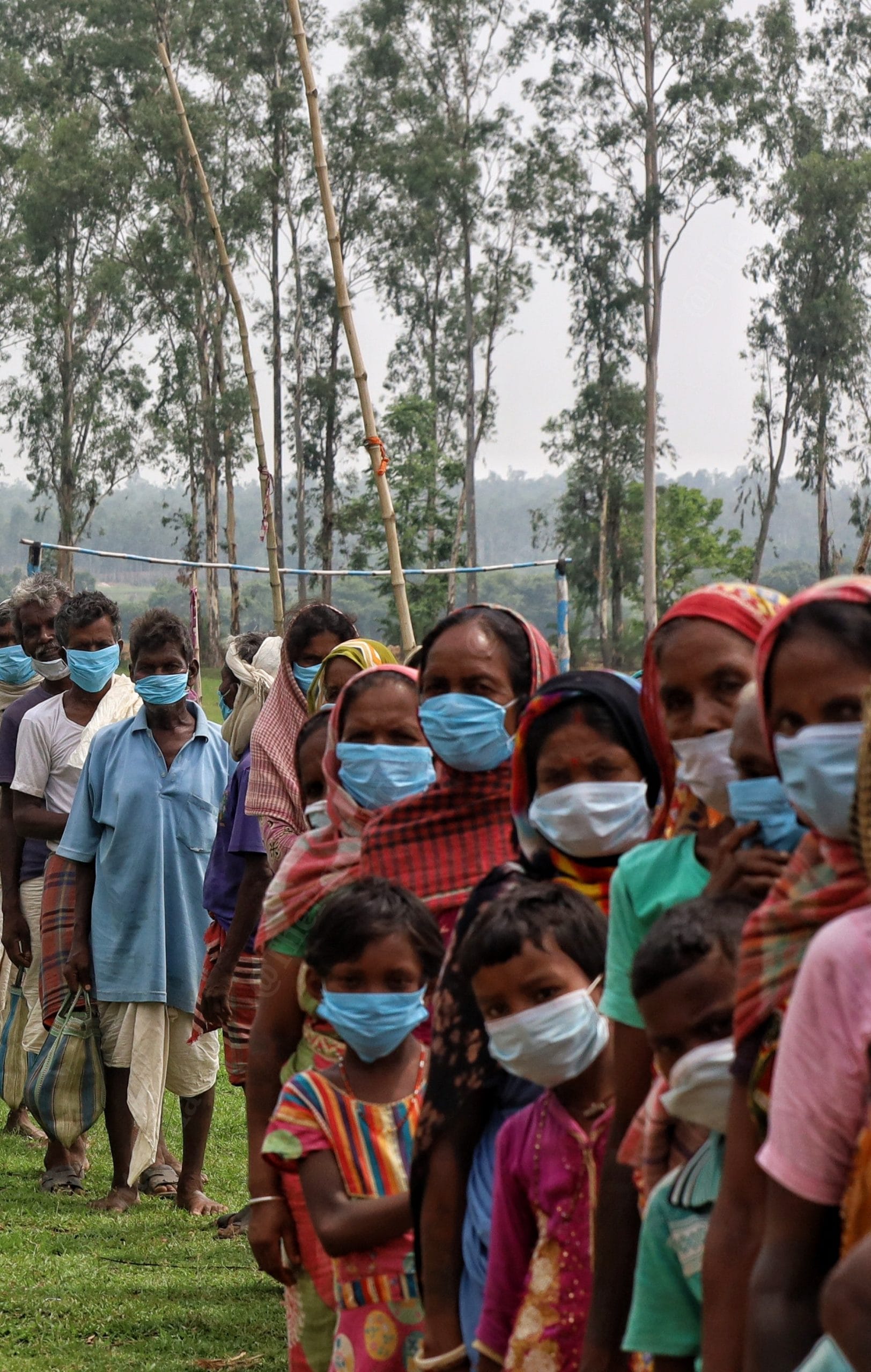 Villagers stand in queue| Photo: Manisha Mondal | ThePrint