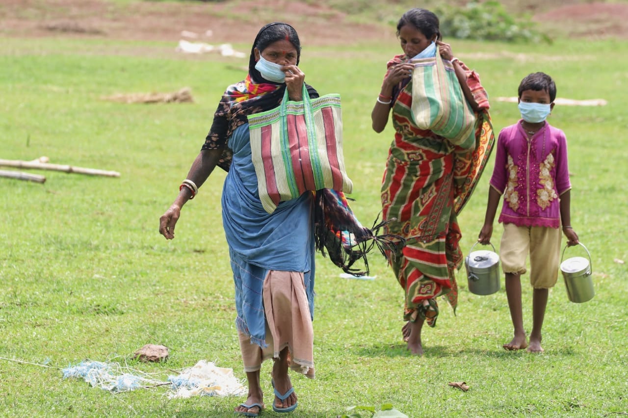 Before reaching the centre, everyone makes sure they are wearing masks | Photo: Manisha Mondal | ThePrint