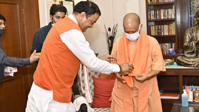 UP Chief Minister Yogi Adityanath with Deputy CM Keshav Prasad Maurya at the latter's Lucknow residence Tuesday | Twitter | @kpmaurya1