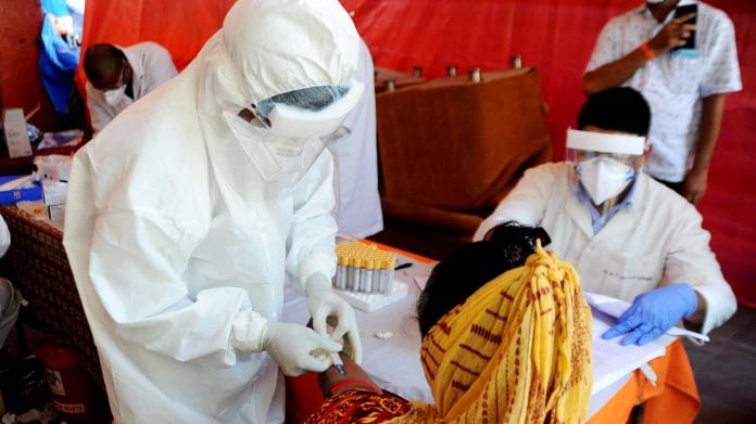 ICMR doctors take blood samples for a study in Dharavi, Mumbai, on 30 May 2021 | ANI Photo
