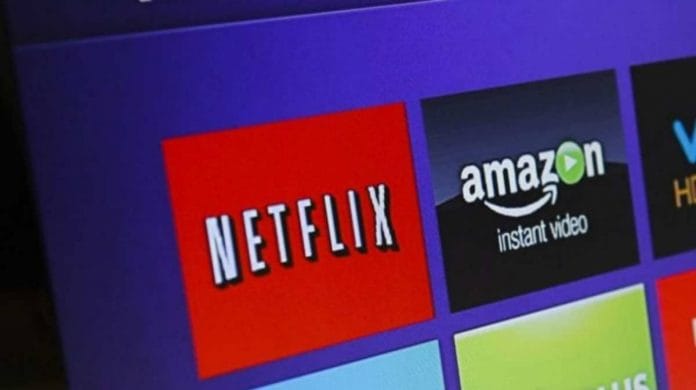 Representational image of a television streaming player menu screen featuring OTT platforms Netflix, Amazon Prime Video | Photo: Patrick T. Fallon | Bloomberg
