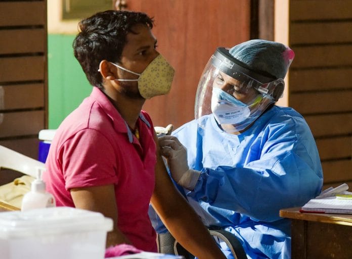 A health worker administers a jab of Covid-19 vaccine to a beneficiary in New Delhi | Representational image | Photo: ANI