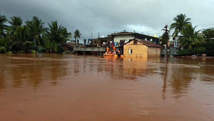 NDRF team carries out rescue and relief operations in a flood-affected area in the Konkan division on 24 July 2021 | ANI