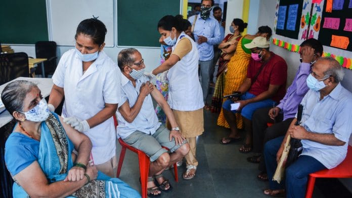 Health workers administer Covid-19 vaccine dose to senior citizens, at Thane on 7 July 2021| Photo: PTI