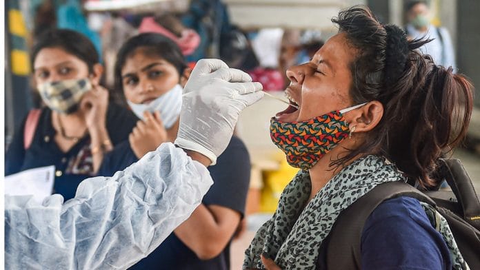 A health worker takes swab sample for Covid-19 testing | Representational image | PTI