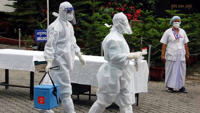 Representational image. | Medics collect swab samples of Covid-19 patients at a hospital in Guwahati. | Photo: ANI