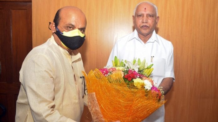 Basavaraj Bommai (left) with outgoing chief minister B.S. Yediyurappa | Twitter: @BSBommai
