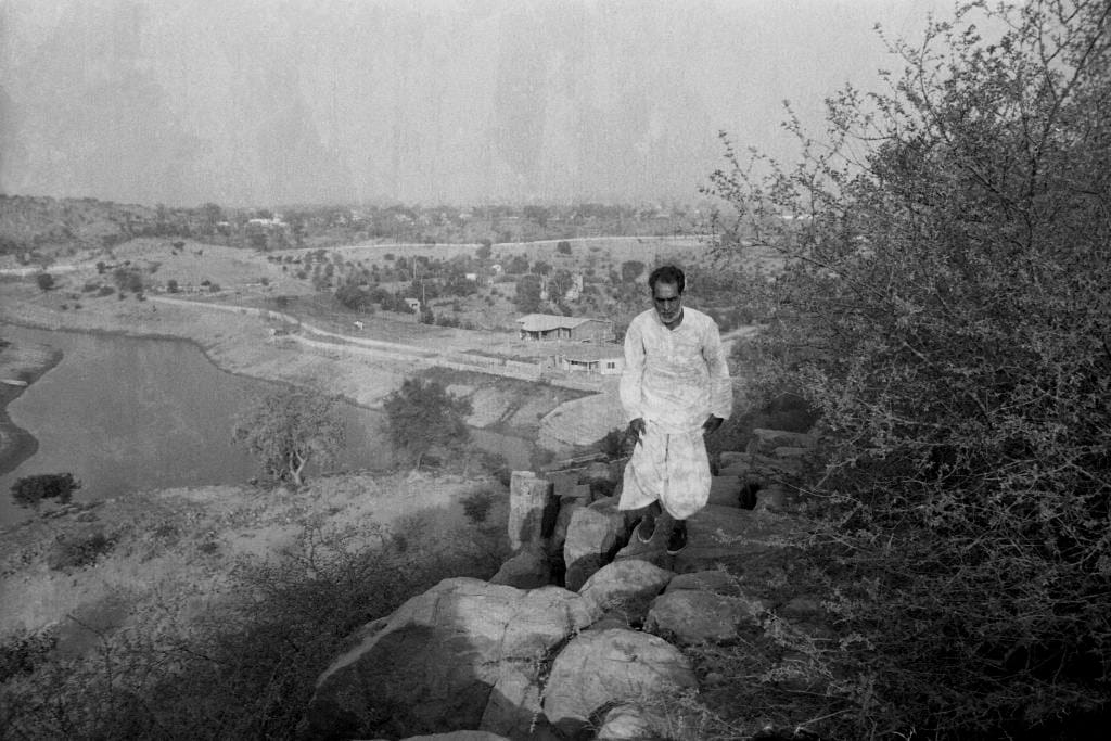 Chandra Shekhar hikes rocks in his ashram in Bhonsdi | Photo: Praveen Jain 