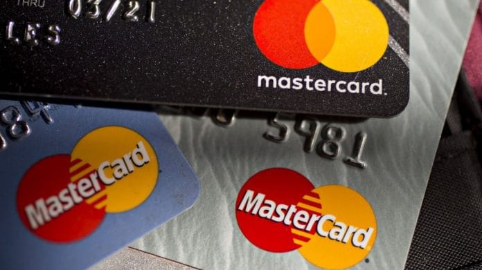 Mastercard Inc. credit cards are arranged for a photograph in Arlington, Virginia, US | Photographer: Andrew Harrer | Bloomberg file photo
