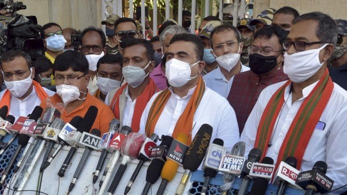 Leader of Opposition Suvendhu Adhikari along with BJP MLAs speak to media after meeting with Governor Jagdeep Dhankhar at Raj Bhavan in Kolkata, on 13 July 2021 | PTI
