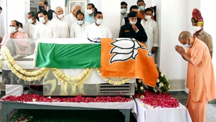 The BJP flag is placed on top of the Tricolour as former UP CM Kalyan Singh lies in state in Lucknow Sunday | ANI