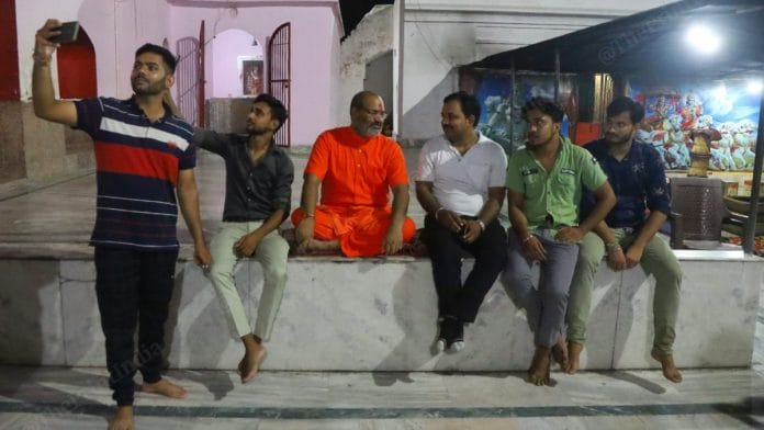 Yati Narsinghanand Saraswati with devotees at the Dasna Devi temple in Ghaziabad | Photo: Manisha Mondal/ThePrint
