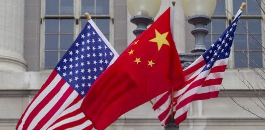 File photo | Flags of the US and China fly along Pennsylvania Avenue in Washington | D.C Andrew Harrer/Bloomberg