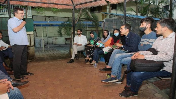 Sanjay Nahar, founder, Sarhad, with Afghan students in Pune.