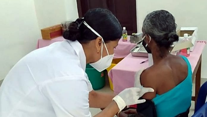 Representational image | A beneficiary receives a dose of the Covid-19 vaccine at a vaccination centre, in Kerala in July 2021 | ANI