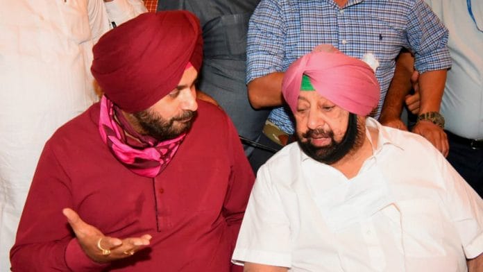 Congress leader Navjot Singh Sidhu with Punjab Chief Minister Capt Amarinder Singh | PTI file photo