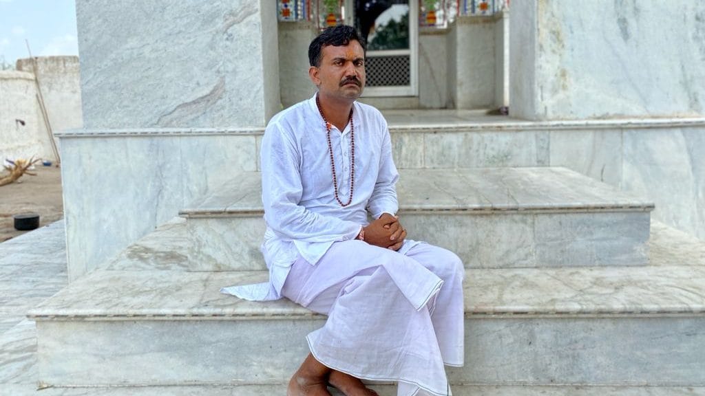 The priest at the temple, Shrawan Kumar Meena | Photo: Nirmal Poddar/ThePrint