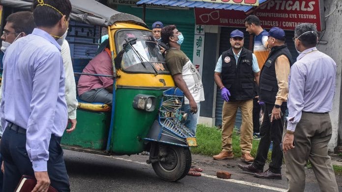 CBI re-creates a scene during their investigation of Additional District Judge Uttam Anands alleged murder case at Randhir Verma Chauk in Dhanbad, on 8 August 2021 | PTI