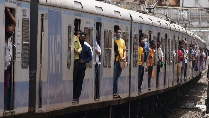 A local train leaves from Dadar station in Mumbai, on 21 June 2021
