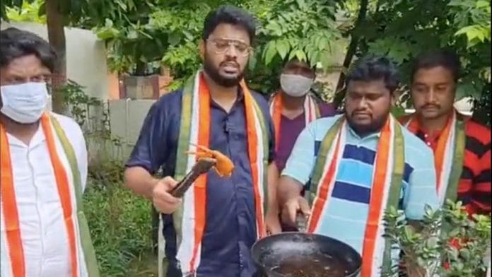 Congress leader G.V. Sri Raj frying the 'Twitter bird' to protest the suspension of Rahul Gandhi's account | Twitter screengrab