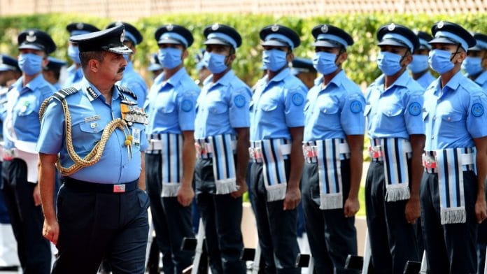 Newly appointed IAF chief Air Chief Marshal V.R. Chaudhari inspects the guard of honour, at the Air Force Headquarters, in New Delhi Thursday | ANI