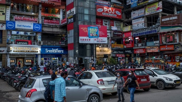 People at a market place in Ranchi | Bloomberg Photo