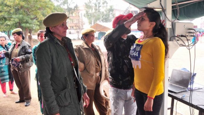 Representational image | Jammu and Kashmir police personnel measure the height of a girl during a recruitment rally in January 2020 | ANI Photo