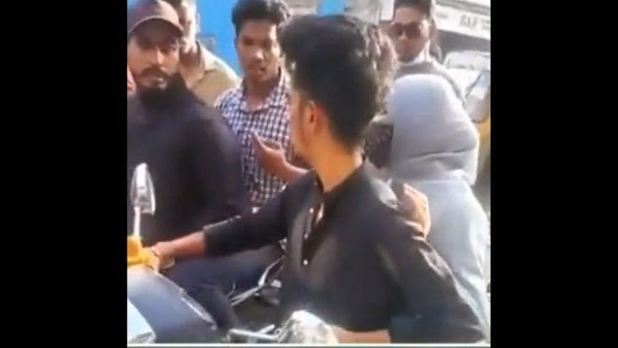 Screengrab of video of a Hindu man and Muslim woman being stopped by a mob in Hyderabad, Telangana, in September 2021.