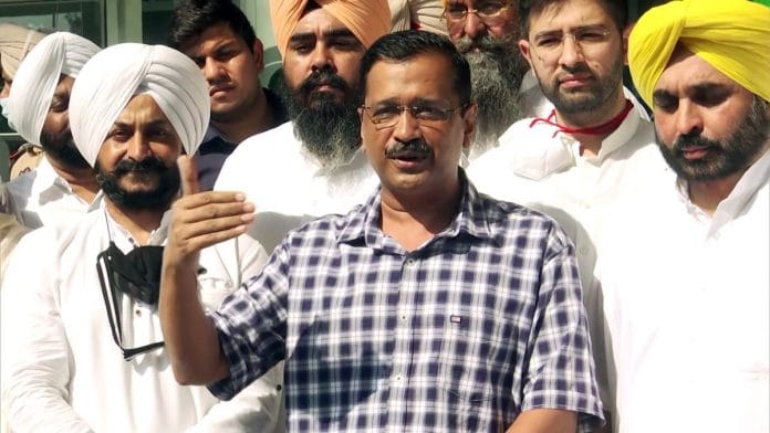 Delhi Chief Minister Arvind Kejriwal speaks to the media as he arrives at the airport in Mohali, Punjab, on 29 September 2021 | ANI photo