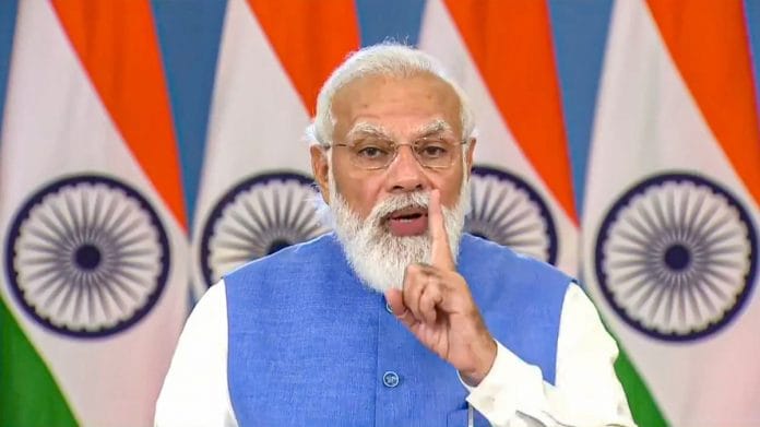PM Narendra Modi addressing the Global Covid-19 Summit, via video conferencing, in Washington DC on 22 September 2021 | PTI