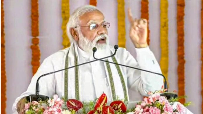Prime Minister Narendra Modi addresses during laying foundation stone of Raja Mahendra Pratap Singh State University in Aligarh on 14 September 2021 | PTI