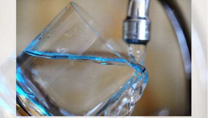 Tap water fills a glass | Representational image| Photographer: Fred Tanneau/AFP/Getty Images via Bloomberg
