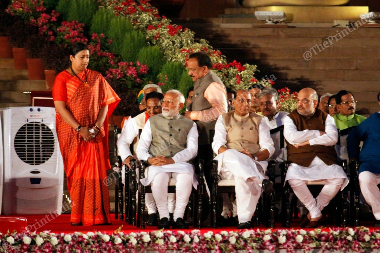 First time Lok Sabha MP Smriti Irani gives way to BJP leader Harshvardhan | Photo: Praveen Jain | ThePrint