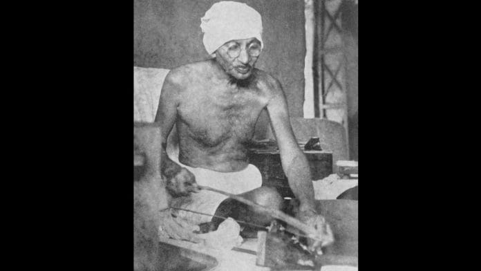 Gandhi at the spinning wheel | Source: Collected Works of Mahatma Gandhi, Volume 74, Frontpiece. Published by the Ministry of Information and Broadcasting, Government of India with the kind permission of the Navajivan Trust, Ahmedabad | Flickr