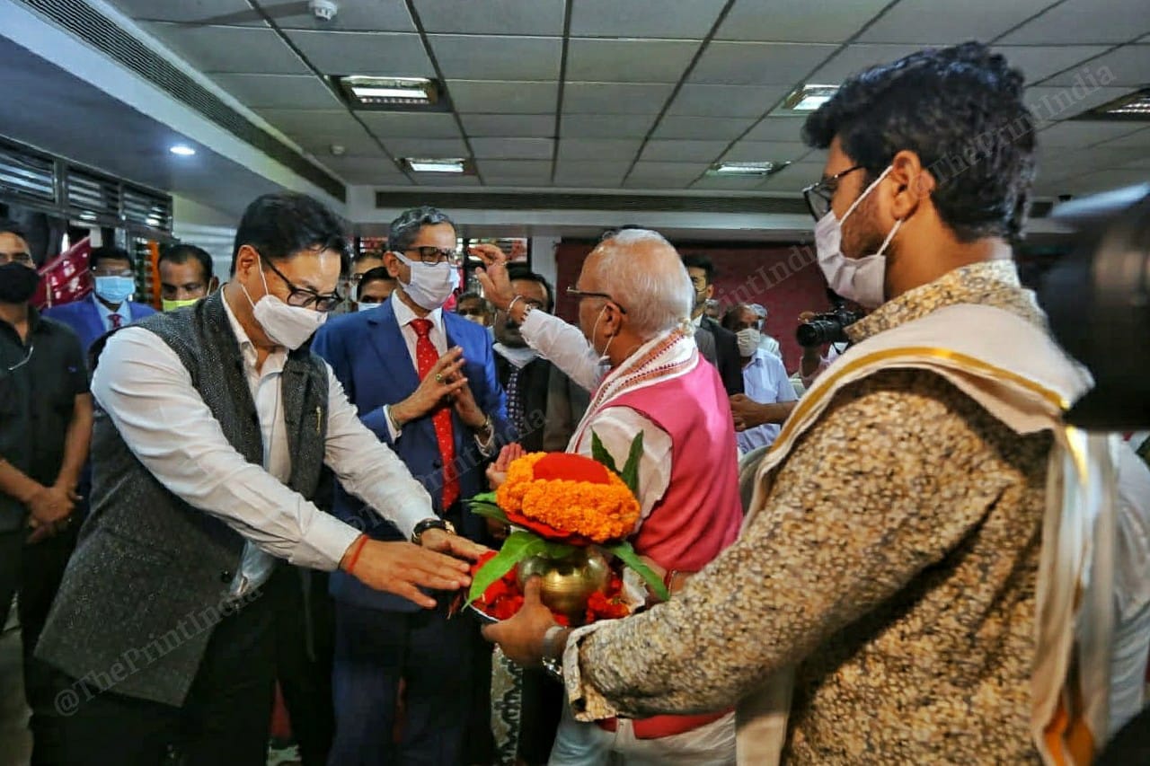 Law Minister Kiren Rijiju and CJI Ramana take part in a puja before entering the event | Praveen Jain | ThePrint