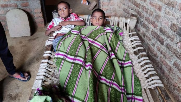 Two boys suffering from dengue at their home in Firozabad's Nagla Amaan village | Shubhangi Misra | ThePrint