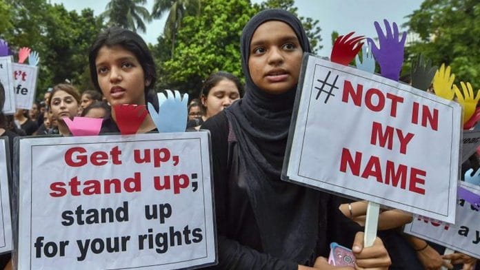 Protests in Delhi over the murder of a civil defence worker.
