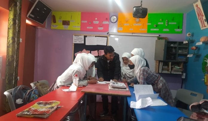 Mohammad Ali with students in a subject-specific classroom at Government Middle School, Karith Shargole, Kargil | Mohammad Ali