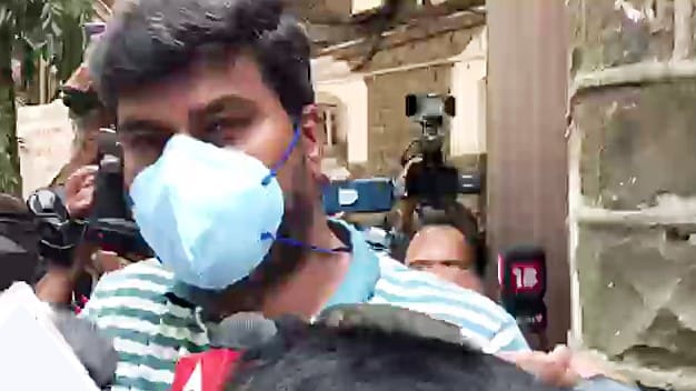 Prabhakar Sail speaks to the media as he leaves from Sahar Police Station in Mumbai, on 25 October 2021 | ANI Photo