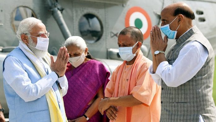 File image of Union Defence Minister Rajnath Singh and PM Narendra Modi. Also seen in the frame, Uttar Pradesh CM Yogi Adityanath and Governor Anandiben Patel | ANI