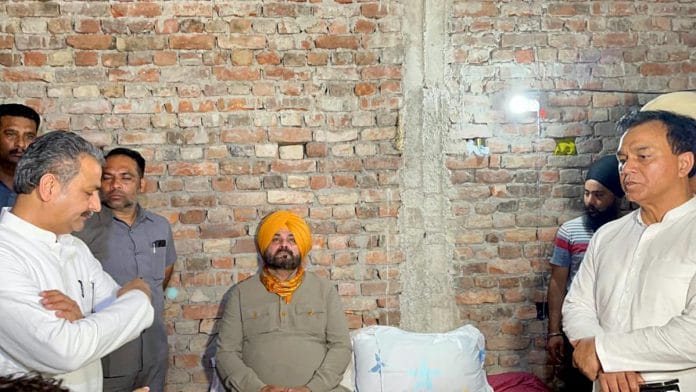 Congress leader Navjot Singh Sidhu starts a hunger strike at the slain journalist Raman Kashyap's house, in Lakhimpur Kheri on 8 October 2021 | ANI photo