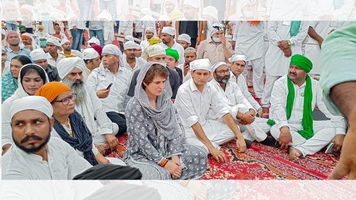 Congress leader Priyanka Gandhi Vadra and prominent farmer leaders attending the last prayers of deceased farmers in Lakhimpur Kheri on 12 October 2021| PTI