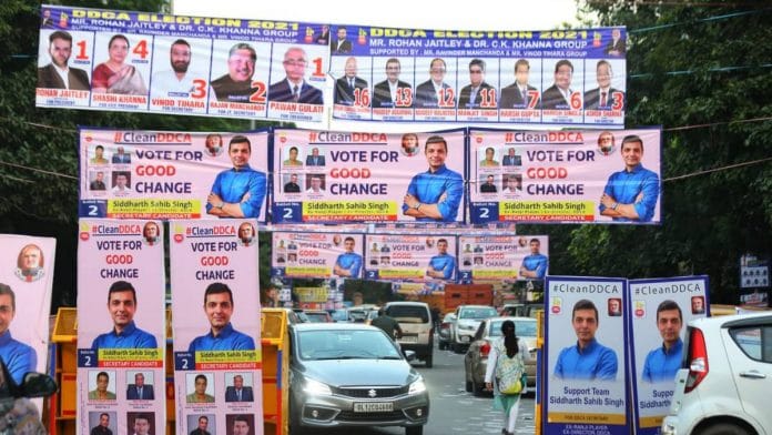 Poster war outside the Arun Jaitley Stadium (Ferozeshah Kotla) on the last day of the DDCA elections Wednesday | Photo: Suraj Singh Bisht | ThePrint