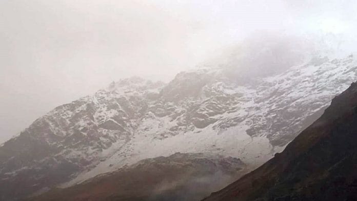 Mountains covered with fresh snow in Badrinath, on 18 October 2021 | ANI Photo