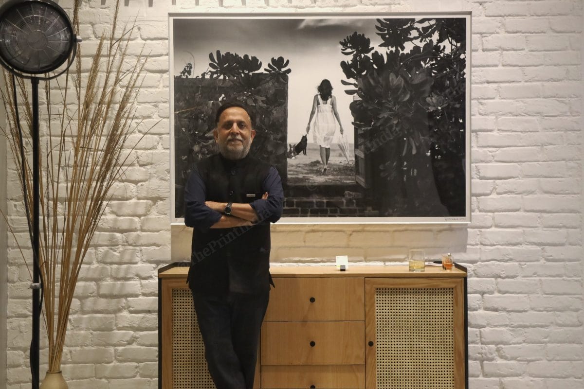 Rohit Chawla posing with one his best pictures | Photo: Manisha Mondal | ThePrint