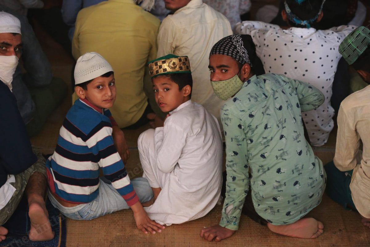 Inside the basement of a school in Sector 12, Muslims offer namaz | Photo: Manisha Mondal | ThePrint