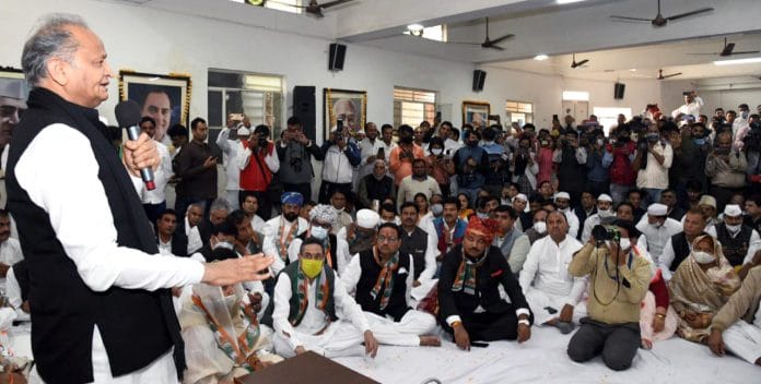 Rajasthan Chief Minister Ashok Gehlot addresses MLAs and party dignitaries ahead of the state cabinet reshuffle at the party's office, in Jaipur on Sunday | ANI